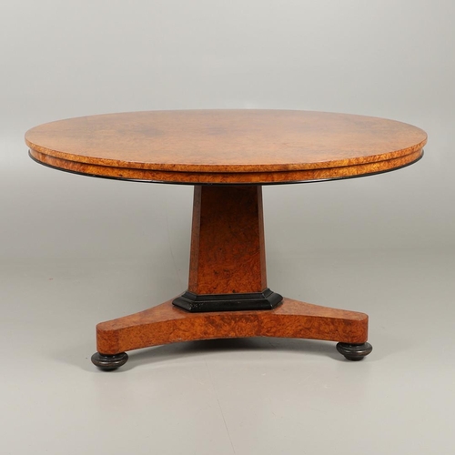 478 - A REGENCY AMBOYNA BREAKFAST TABLE, CIRCA 1815. the circular tilt top with ebonised lower rim upon a ... 