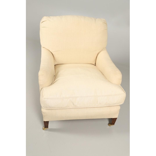 482 - A HOWARD-STYLE DEEP SEATED ARMCHAIR. recovered in beige linen, with removable squab cushion, on squa... 