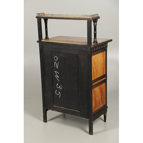 485 - A LATE VICTORIAN AMBOYNA AND EBONISED MUSIC CABINET. the brass galleried upper half with narrow shel... 