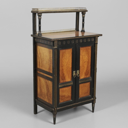 485 - A LATE VICTORIAN AMBOYNA AND EBONISED MUSIC CABINET. the brass galleried upper half with narrow shel... 