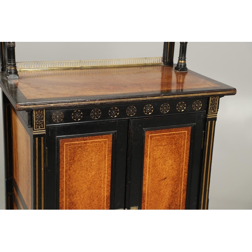 485 - A LATE VICTORIAN AMBOYNA AND EBONISED MUSIC CABINET. the brass galleried upper half with narrow shel... 