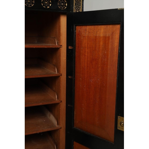 485 - A LATE VICTORIAN AMBOYNA AND EBONISED MUSIC CABINET. the brass galleried upper half with narrow shel... 