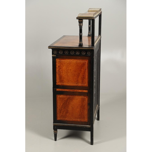 485 - A LATE VICTORIAN AMBOYNA AND EBONISED MUSIC CABINET. the brass galleried upper half with narrow shel... 