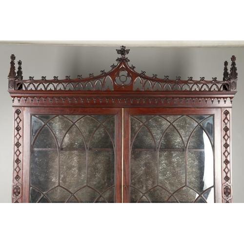 487 - A REGENCY MAHOGANY LIBRARY BOOKCASE, POSSIBLY IRISH. with later carved Gothic style decoration, incl... 