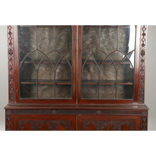 487 - A REGENCY MAHOGANY LIBRARY BOOKCASE, POSSIBLY IRISH. with later carved Gothic style decoration, incl... 