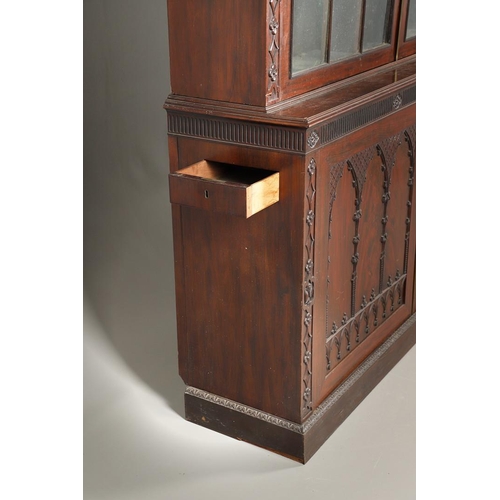 487 - A REGENCY MAHOGANY LIBRARY BOOKCASE, POSSIBLY IRISH. with later carved Gothic style decoration, incl... 