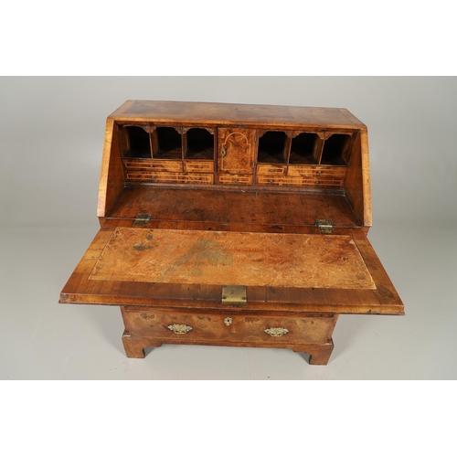 488 - AN 18TH CENTURY INLAID WALNUT BUREAU. with crossbanding and herringbone inlay, the fall front enclos... 