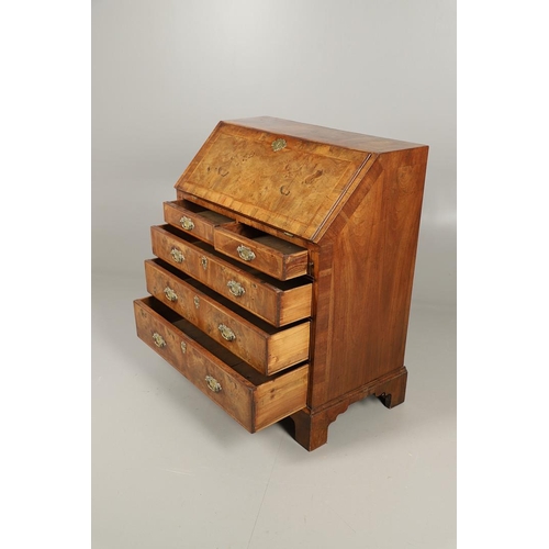 488 - AN 18TH CENTURY INLAID WALNUT BUREAU. with crossbanding and herringbone inlay, the fall front enclos... 