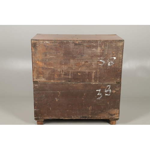 490 - A 19TH CENTURY TEAK CAMPAIGN CHEST. with central secretaire drawer enclosing a burr oak veneered int... 