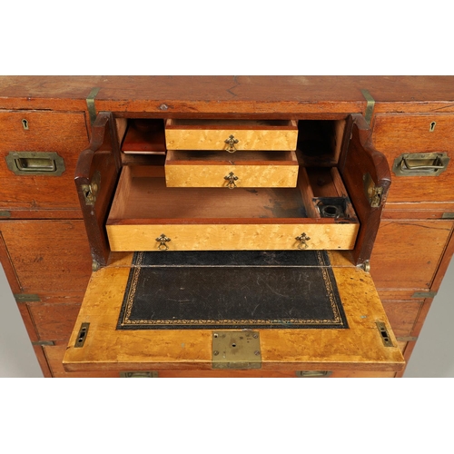 490 - A 19TH CENTURY TEAK CAMPAIGN CHEST. with central secretaire drawer enclosing a burr oak veneered int... 