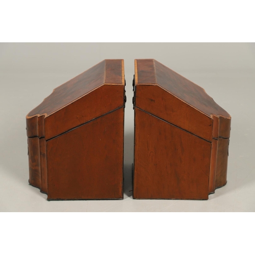 491 - A PAIR OF GEORGE III MAHOGANY KNIFE BOXES. of serpentine form, crossbanded with satinwood, the inter... 