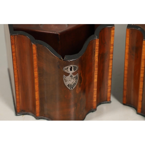 491 - A PAIR OF GEORGE III MAHOGANY KNIFE BOXES. of serpentine form, crossbanded with satinwood, the inter... 