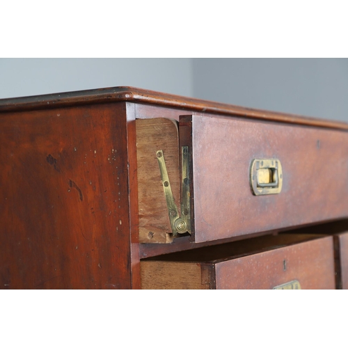 492 - A LATE 19TH CENTURY CAMPAIGN STYLE SECRETAIRE CHEST. possibly teak, the seven drawers with recessed ... 