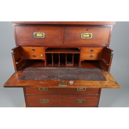 492 - A LATE 19TH CENTURY CAMPAIGN STYLE SECRETAIRE CHEST. possibly teak, the seven drawers with recessed ... 