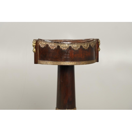 493 - AN EMPIRE STYLE ROSEWOOD JARDINIERE STAND. of elliptical form, the original tin liner upon a cylindr... 