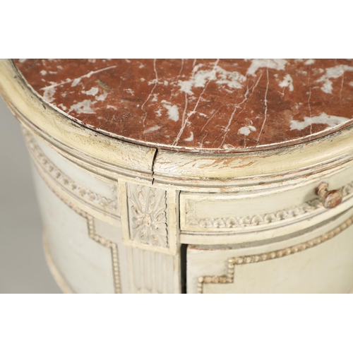 495 - A PAIR OF FRENCH MARBLE TOP PAINTED POT CUPBOARDS. of cylindrical form with moulded Classical motif ... 