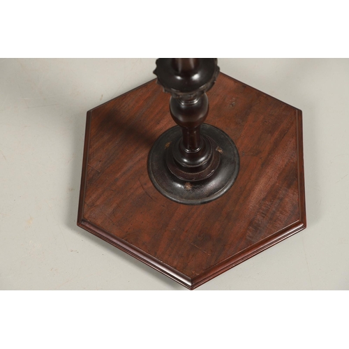 496 - A GEORGE III MAHOGANY PEDESTAL WINE TABLE. the galleried six sided top upon a turned column and trip... 