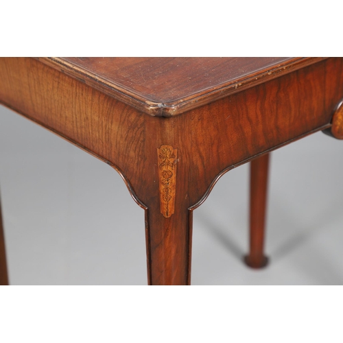 499 - A WILLIAM AND MARY STYLE WALNUT SIDE TABLE. with foliate penwork panels panels set to the single dra... 