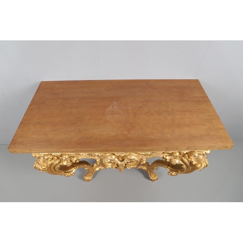 500 - A LOUIS XVI STYLE GILTWOOD CONSOLE TABLE. the solid wood top over an ornate frieze with central C sc... 