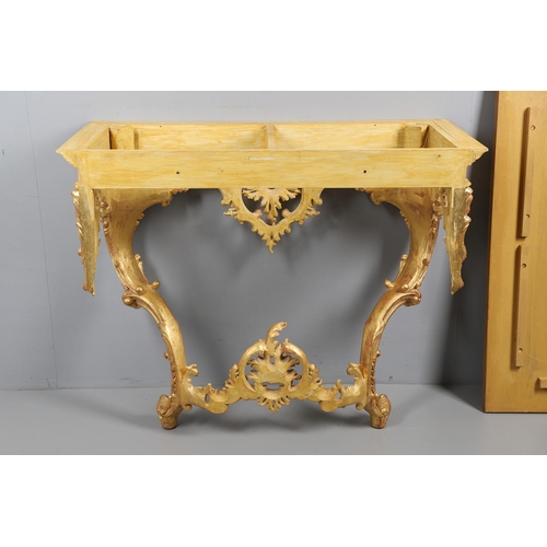 500 - A LOUIS XVI STYLE GILTWOOD CONSOLE TABLE. the solid wood top over an ornate frieze with central C sc... 