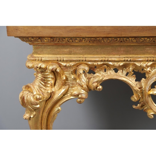 500 - A LOUIS XVI STYLE GILTWOOD CONSOLE TABLE. the solid wood top over an ornate frieze with central C sc... 