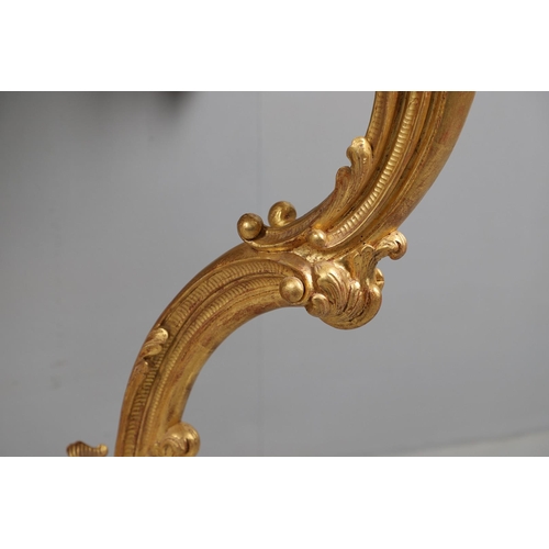 500 - A LOUIS XVI STYLE GILTWOOD CONSOLE TABLE. the solid wood top over an ornate frieze with central C sc... 