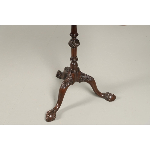 501 - A GEORGE III STYLE MAHOGANY TRAY TOP TRIPOD TABLE. the rectangular galleried tilt top upon a slender... 