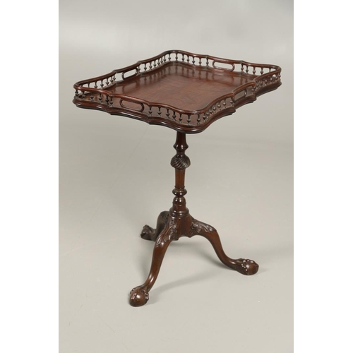 501 - A GEORGE III STYLE MAHOGANY TRAY TOP TRIPOD TABLE. the rectangular galleried tilt top upon a slender... 