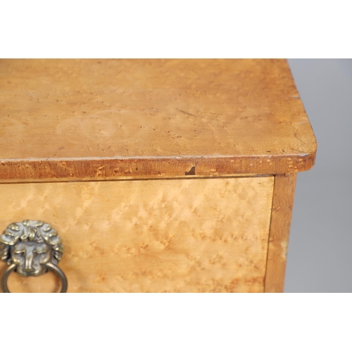 502 - A 19TH CENTURY BIRD'S EYE MAPLE CHEST OF DRAWERS. Circa 1880, fitted three long drawers with lions m... 