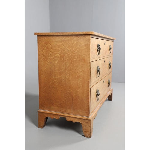 502 - A 19TH CENTURY BIRD'S EYE MAPLE CHEST OF DRAWERS. Circa 1880, fitted three long drawers with lions m... 