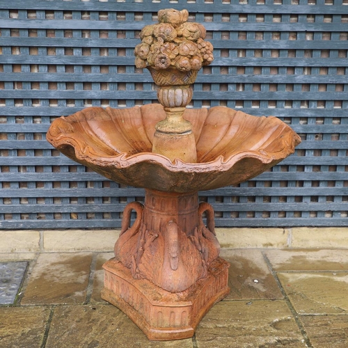 516 - A VICTORIAN STYLE COMPOSITE STONE FOUNTAIN. with terracotta finish, the central column moulded as fr... 