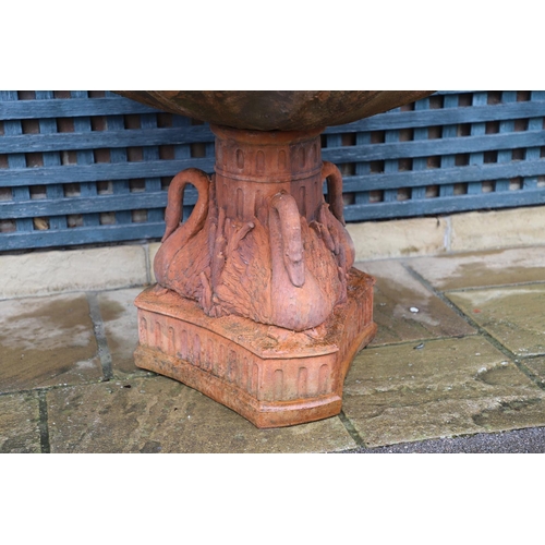 516 - A VICTORIAN STYLE COMPOSITE STONE FOUNTAIN. with terracotta finish, the central column moulded as fr... 