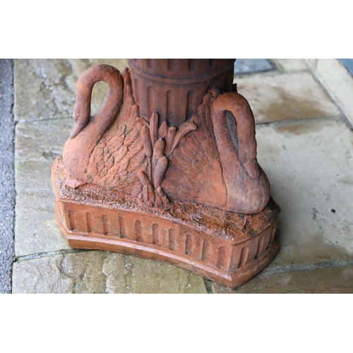 516 - A VICTORIAN STYLE COMPOSITE STONE FOUNTAIN. with terracotta finish, the central column moulded as fr... 