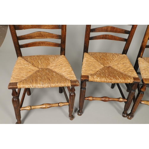 524 - A MATCHED SET OF EIGHT ELM AND ASH LADDERBACK CHAIRS. early 19th century, comprising six singles and... 