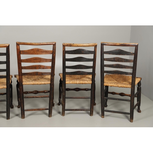 524 - A MATCHED SET OF EIGHT ELM AND ASH LADDERBACK CHAIRS. early 19th century, comprising six singles and... 