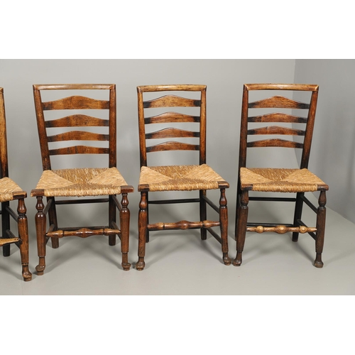 524 - A MATCHED SET OF EIGHT ELM AND ASH LADDERBACK CHAIRS. early 19th century, comprising six singles and... 