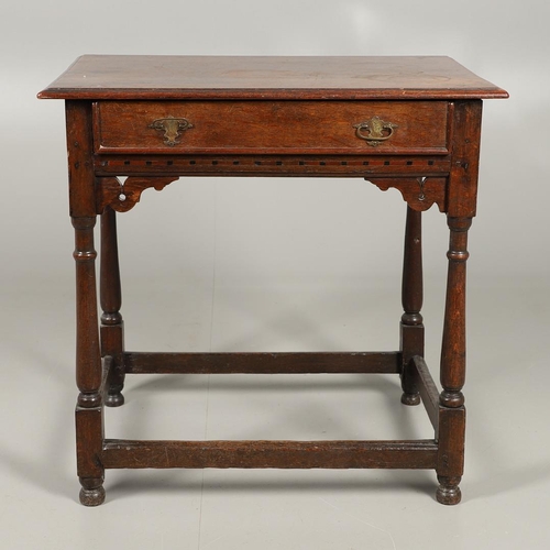 525 - AN EARLY 19TH CENTURY OAK SIDE TABLE, CIRCA 1800. with single drawer over a frieze of geometric inla... 