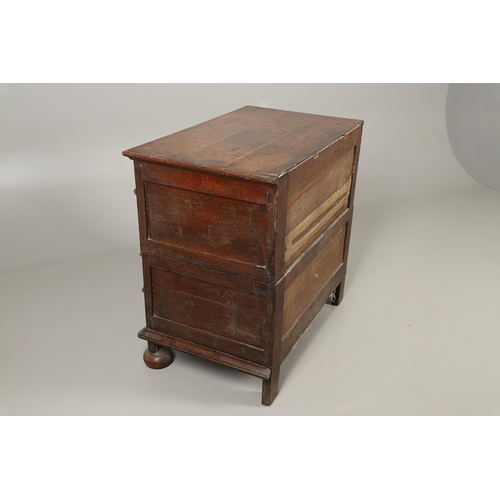 528 - A LATE 17TH CENTURY OAK CHEST OF DRAWERS. the triple plank top to panelled sides and four long panel... 