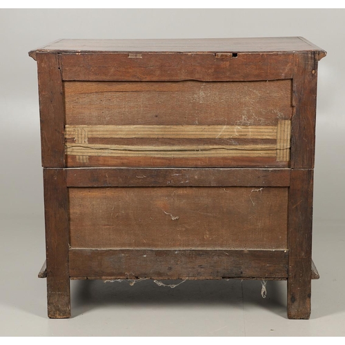 528 - A LATE 17TH CENTURY OAK CHEST OF DRAWERS. the triple plank top to panelled sides and four long panel... 