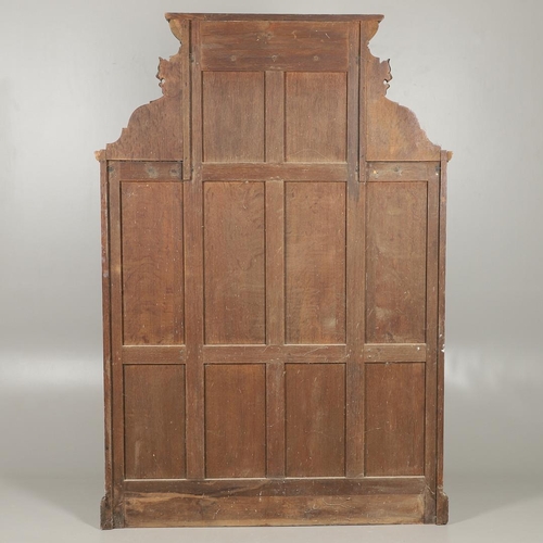 529 - A LARGE CARVED OAK COUNTRY HOUSE HALLSTAND. with a shaped cornice and panel back, carved Lion masks ... 