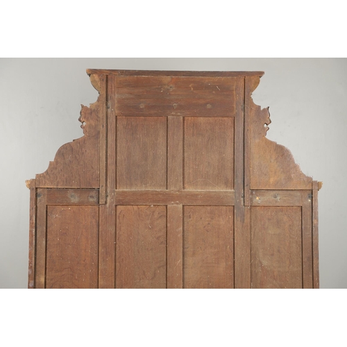 529 - A LARGE CARVED OAK COUNTRY HOUSE HALLSTAND. with a shaped cornice and panel back, carved Lion masks ... 