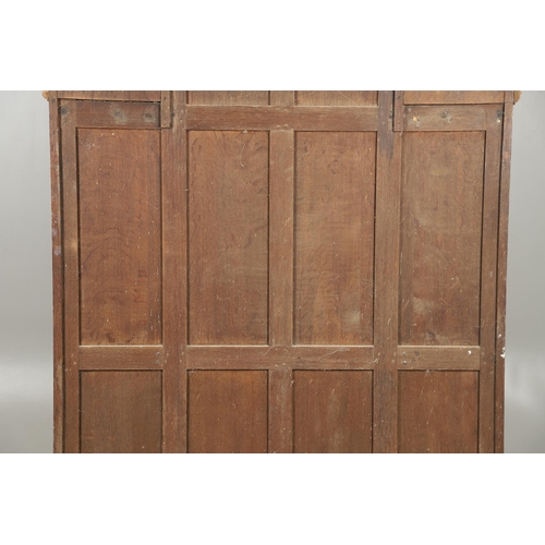 529 - A LARGE CARVED OAK COUNTRY HOUSE HALLSTAND. with a shaped cornice and panel back, carved Lion masks ... 