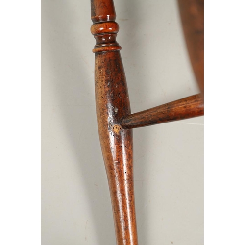 531 - A YEW AND ELM WINDSOR ELBOW CHAIR. early 19th century, Buckingham or Oxford, the cross and roundel b... 