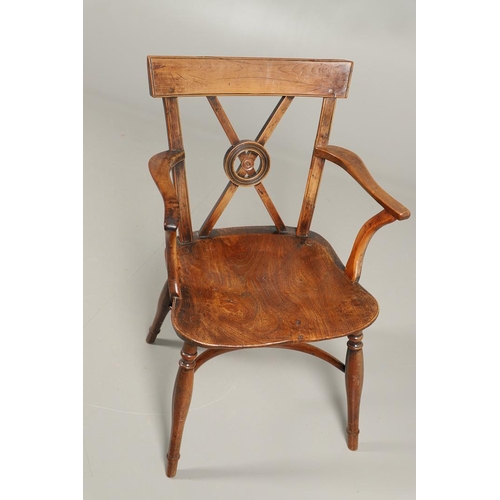 531 - A YEW AND ELM WINDSOR ELBOW CHAIR. early 19th century, Buckingham or Oxford, the cross and roundel b... 