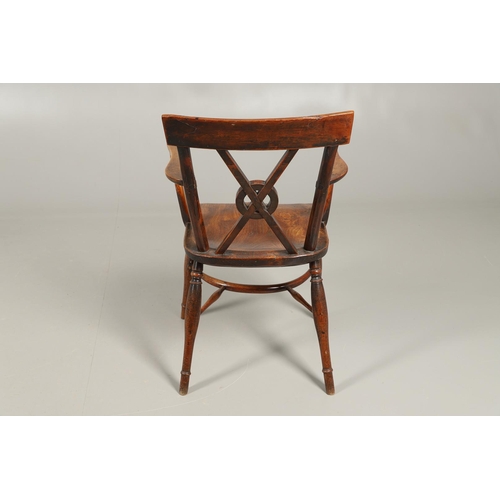 531 - A YEW AND ELM WINDSOR ELBOW CHAIR. early 19th century, Buckingham or Oxford, the cross and roundel b... 