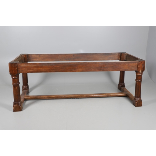 533 - AN EARLY 20TH CENTURY OAK AND ELM REFECTORY TABLE. the elm five plank top upon turned and block supp... 