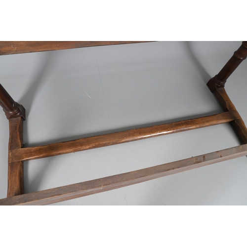 533 - AN EARLY 20TH CENTURY OAK AND ELM REFECTORY TABLE. the elm five plank top upon turned and block supp... 