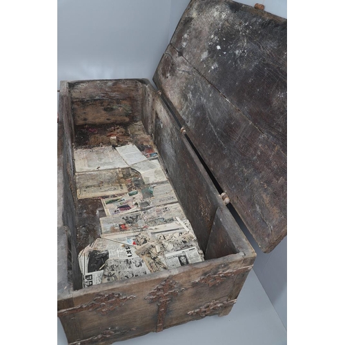 534 - A SUBSTANTIAL ANTIQUE OAK AND IRON STRAPWORK CHEST. the two plank lid and body bound with ornate str... 