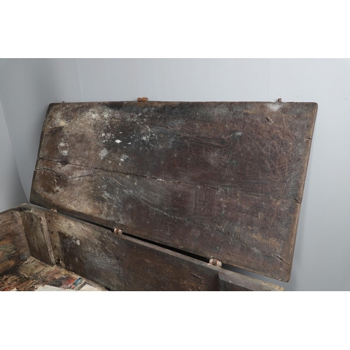 534 - A SUBSTANTIAL ANTIQUE OAK AND IRON STRAPWORK CHEST. the two plank lid and body bound with ornate str... 