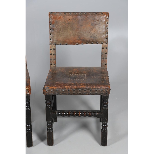 535 - A PAIR OF 17TH CENTURY OAK BACKSTOOLS. with original brass studded leather upholstery on turned and ... 